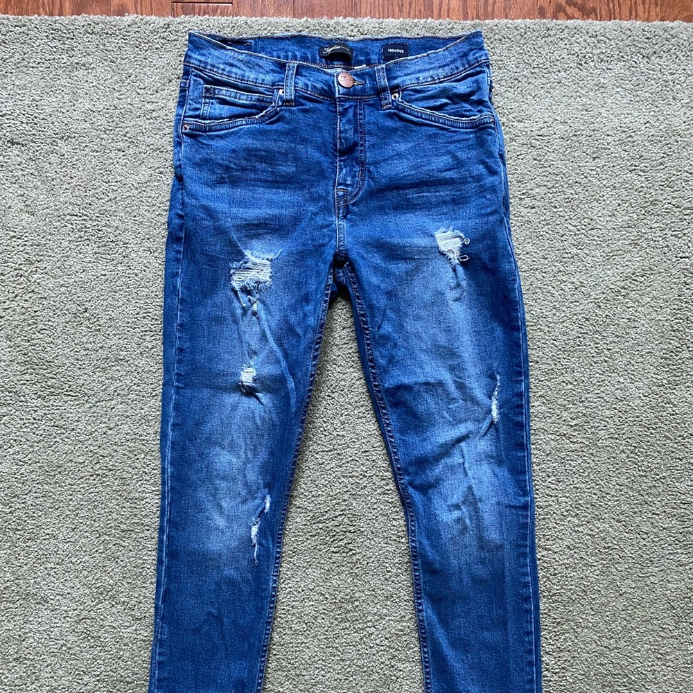 Supplies high rise distressed skinny jeans